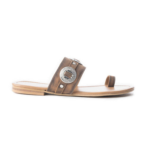 Brown sandal with a decorative buckle on a white background