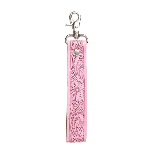 Pink leather key fob with floral tooling on a white background