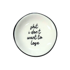 White ceramic plate with black text 'shit i don't want to lose' on a white background