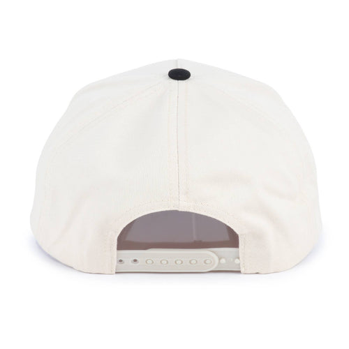 The back view of a structured snapback cap in off-white canvas, featuring a black button on top and a light-colored plastic adjustment slider on the rear.