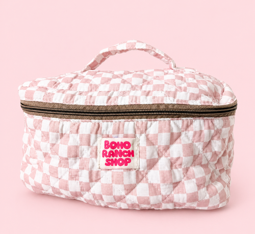 Pink and white checkered bag with 'Boho Ranch Shop' label on a pink background