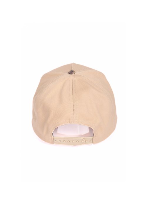 Beige cap on a white background