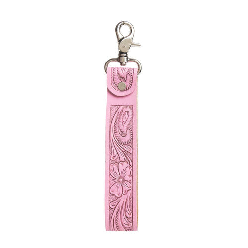 Pink leather key fob with floral patterns on a white background